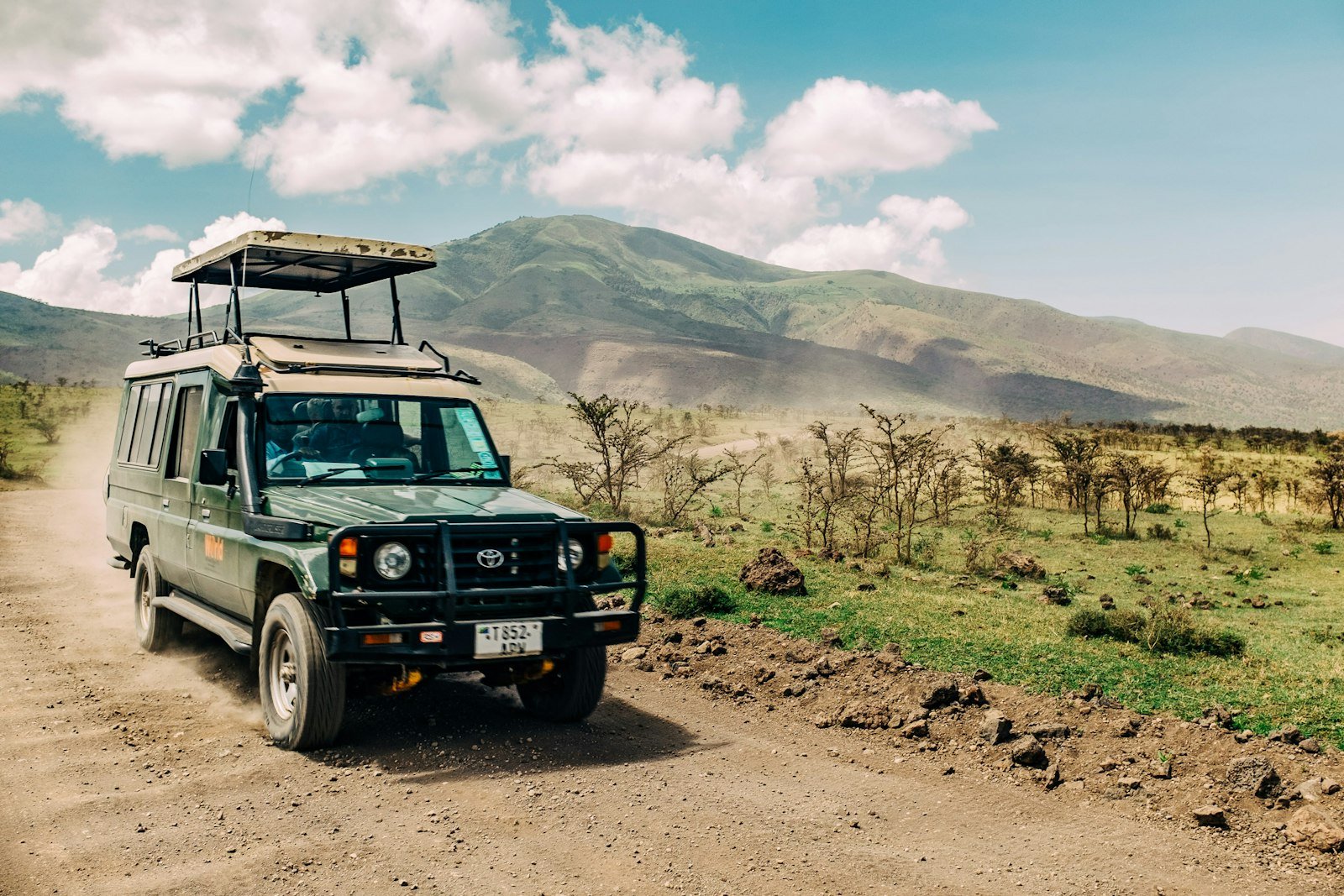 Safari vehicle on a dirt road